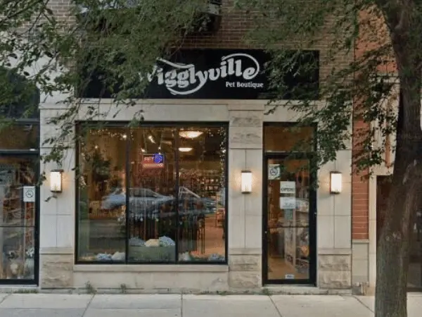 The outside of Wigglyville, an establishment that offers dog grooming in Chicago